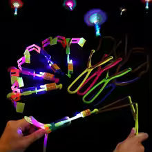 New Outdoor Amazing Light Toy Arrow Rocket Helicopter Flying Toy LED Light Toys Party Fun Gifts Rubber Band Catapult Gift and the pair of 5 in 1 set